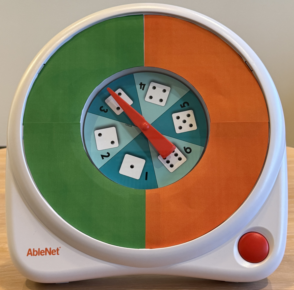 The AbleNet All-Turn-It Spinner with a two-color, green and orange, overlay.