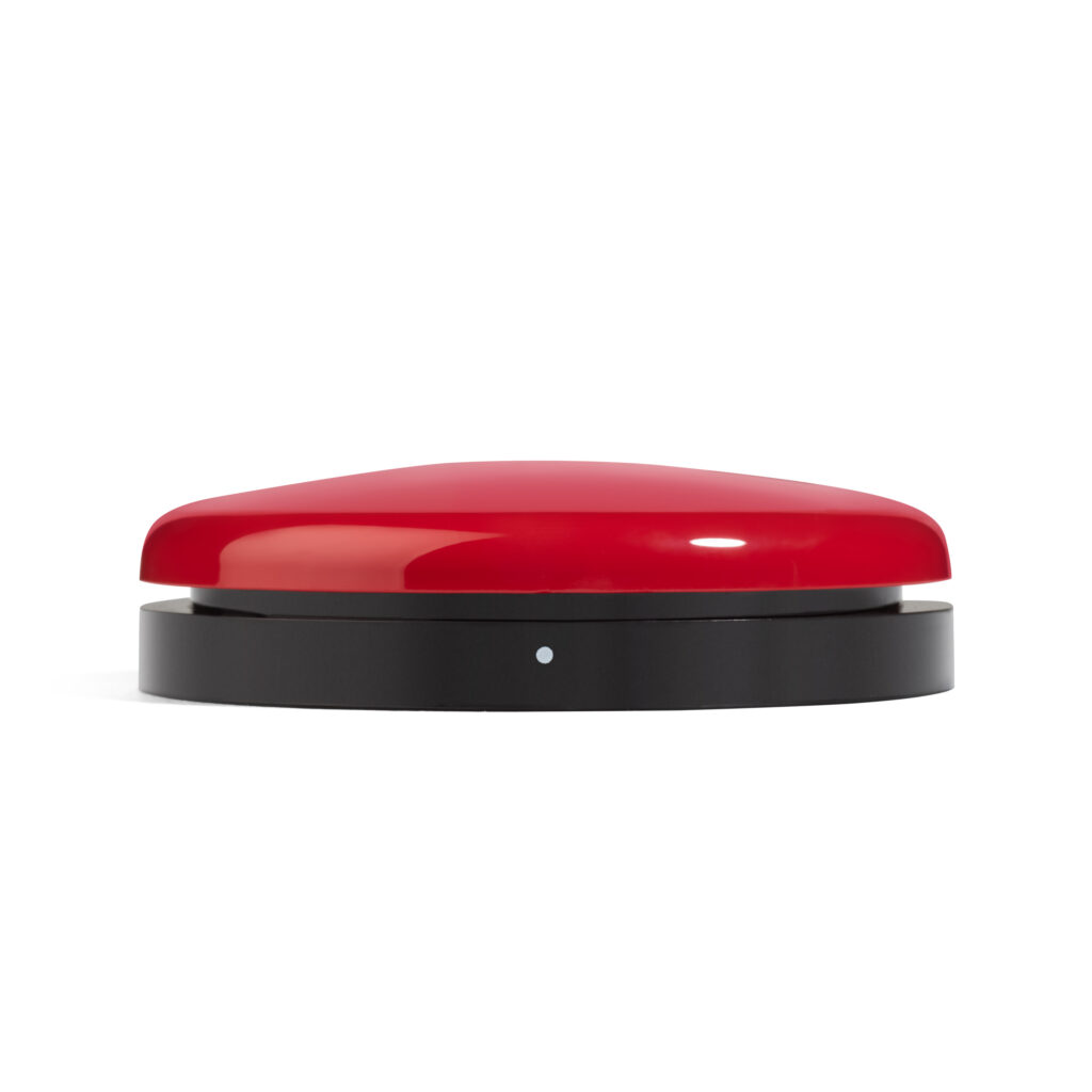 Side view of Buddy Button IC with white dot marker visible on switch base
