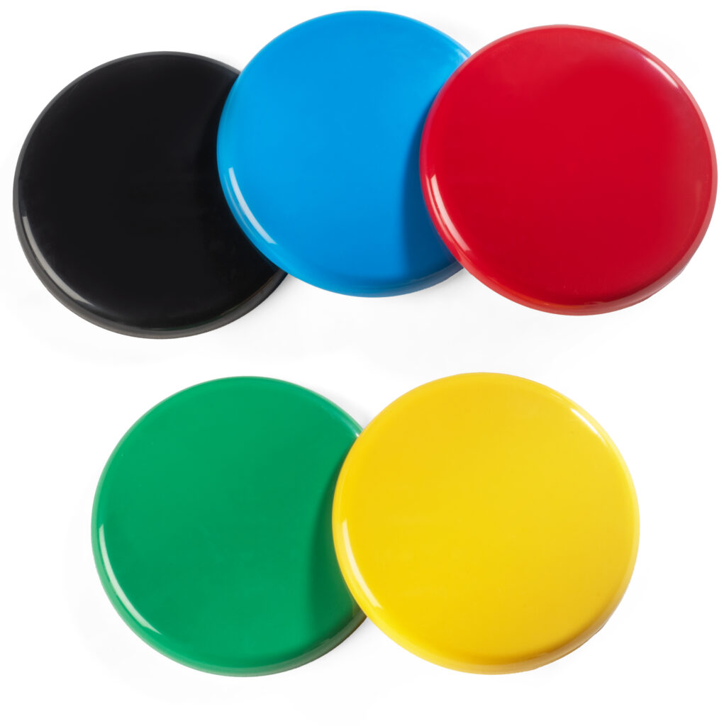 Five interchangeable Buddy Button IC switch tops in black, blue, red, green, and yellow